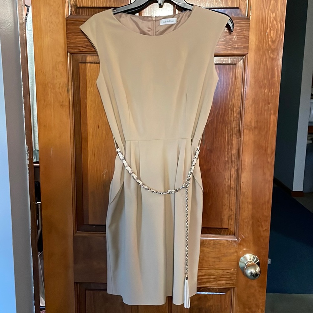 Calvin Klein Sz 4 lined dress. Dress has chain belt.